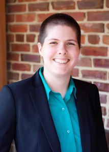 Professional headshot of the candidate, smiling, in front of a brick wall

Photo by Season Moore Photography