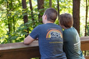 The candidate and their wife on a bridge at MLK Jr. Park in Carrboro.

Photo by Alicia Stemper